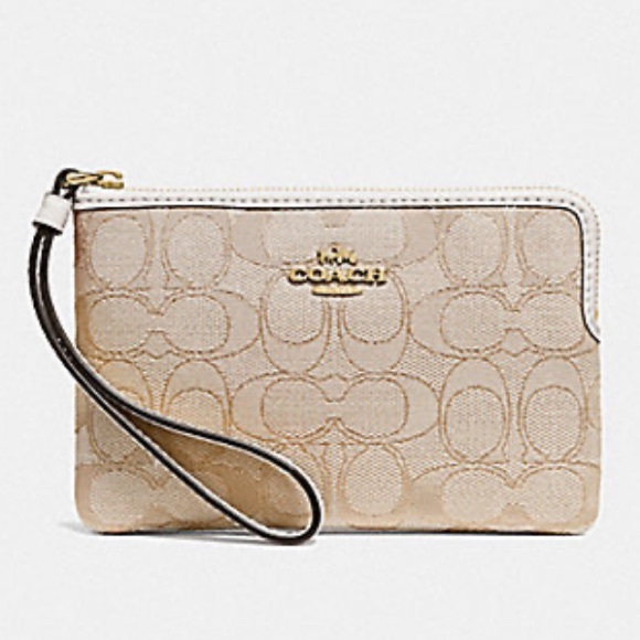 Coach Handbags - Like new Coach signature corner zip wristlet.